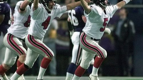 Falcons kicker Morten Andersen, right, and holder Dan Stryzinski (4) celebrate after Andersen's game-winning 38-yard field goal beat the Minnesota Vikings 30-27 in overtime for the NFC championship at the Metrodome in Minneapolis Sunday, Jan. 17, 1999. File photo