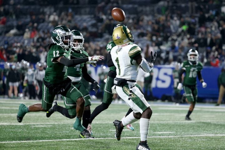 Dec. 30, 2020 - Atlanta, Ga: Grayson wide receiver Jamal Haynes (1) catches a touchdown pass from quarterback Jake Garcia (not pictured) against Collins Hill defensive back Travis Hunter (12) in the first half during the Class 7A state high school football final at Center Parc Stadium Wednesday, December 30, 2020 in Atlanta. JASON GETZ FOR THE ATLANTA JOURNAL-CONSTITUTION