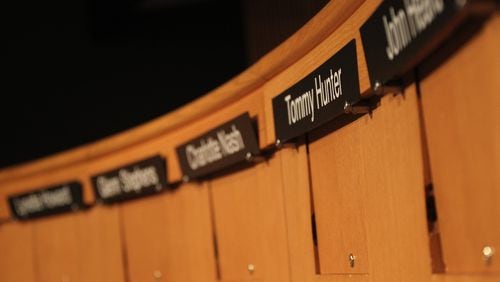 January 17, 2017, Atlanta - The array of names on the front of the round desk in the Gwinnett County Justice Department’s auditorium in Atlanta, Georgia, on Tuesday, January 17, 2017. (HENRY TAYLOR / HENRY.TAYLOR@AJC.COM)