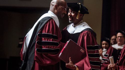 Morehouse College Interim President Bill Taggart (R) talks with commencement speaker Van Jones (L) during the Morehouse College graduation ceremony in the Martin Luther King JR. International Chapel on The Morehouse Campus Sunday, May 21, 2017. STEVE SCHAEFER / SPECIAL TO THE AJC