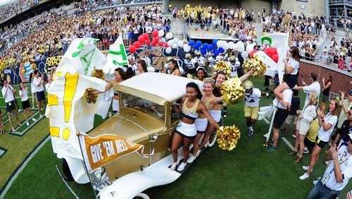 ATLANTA, GA - SEPTEMBER 12: Members of the Georgia Tech Yellow Jackets take the field before the game against the Tulane Green Wave on September 12, 2015 in Atlanta, Georgia. Photo by Scott Cunningham/Getty Images)