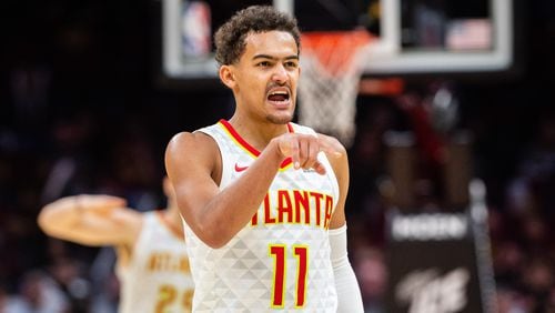 Trae Young  of the Atlanta Hawks celebrates after the Hawks scored against the Cleveland Cavaliers during the second half at Quicken Loans Arena on October 21, 2018 in Cleveland, Ohio. The Hawks defeated the Cavaliers 133-111.  (Photo by Jason Miller/Getty Images)