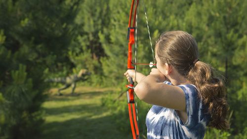 A young archer hones her skills at Panola Mountain State Park.