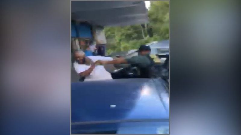 This is a screenshot of a video footage showing an altercation between an Atlanta police officer and a suspect. (Credit: Channel 2 Action News)
