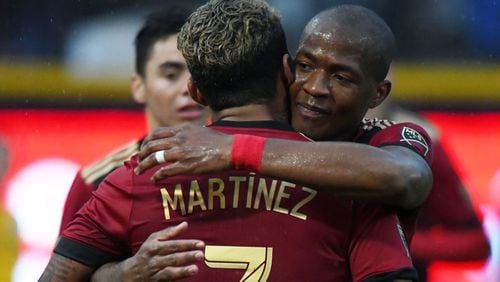 Atlanta United's Darlington Nagbe congratulates Josef Martinez after his goal in the second half of Saturday's friendly at First Tennessee Park in Nashville. (Christopher Hanewinckel-USA TODAY Sports)