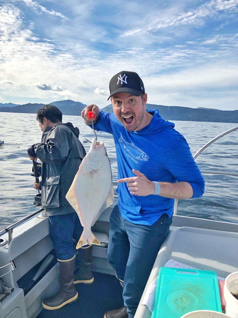 Chadwick Boyd catches a 60-pound halibut on an Alaskan fishing trip.
Courtesy of Brooke Slezak