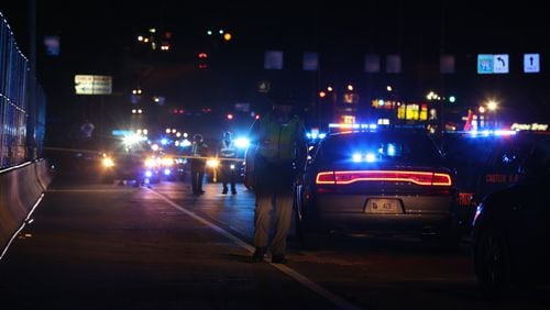 An investigation was underway after a Georgia State Patrol trooper was struck by a vehicle Wednesday night in Cobb County. (Ben Gray / bgray@ajc.com)