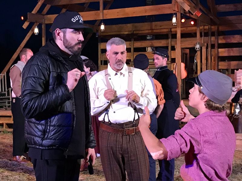 Serenbe Playhouse founder and artistic director Brian Clowdus gives direction to Taylor Hicks (center) and Pilot Bunch (right) before the dress rehearsal of "Shenandoah" on March 12, 2019.