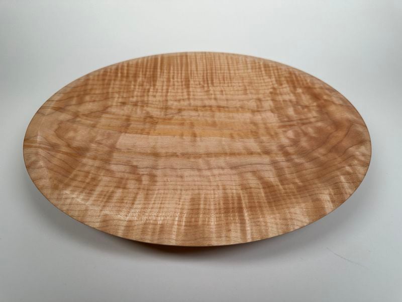 This flame maple bowl showcases natural patterns.