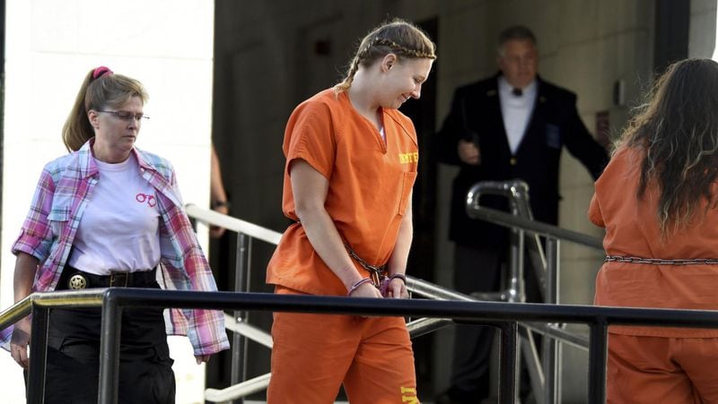 Reality Winner, charged with leaking a top-secret government document to a news outlet, walks into the federal courthouse in Augusta, Ga., Tuesday, June 26, 2018. (Michael Holahan/The Augusta Chronicle via AP)