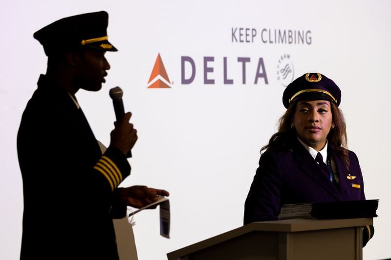 (L-R) Pilots Kyle Greene and Anya Kearns speak at graduation for Delta’s Aviation Career Education and Solo Flight Academy programs at Delta Headquarters in Atlanta on Thursday, July 14, 2022. (Arvin Temkar / arvin.temkar@ajc.com)