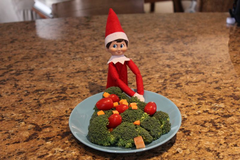 Elf on the Shelf sets a good example by eating vegetables. CONTRIBUTED BY CHILDREN’S HEALTHCARE OF ATLANTA’S STRONG4LIFE