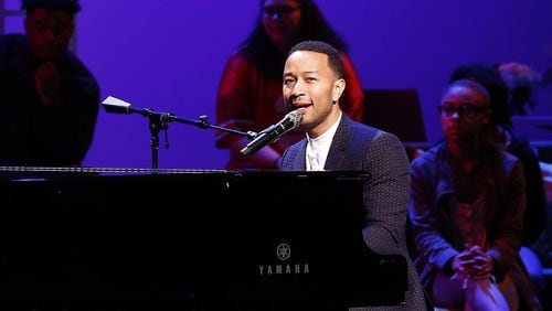 In this file photo, John Legend performs on stage during a concert following the ribbon cutting for the new John Legend Theater in Springfield, Ohio.