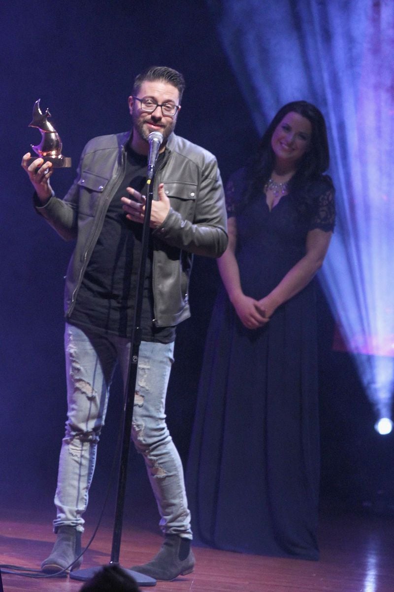  NASHVILLE, TN - OCTOBER 11: Danny Gokey recieves award onstage at the Dove Awards 2016 Pre Show, Lipscomb University on October 11, 2016 in Nashville, Tennessee. (Photo by Terry Wyatt/Getty Images for Dove Awards)
