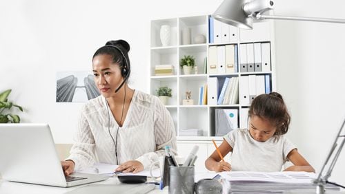 Workplaces rarely have a set policy on bringing kids to offices, but one expert says it can’t hurt to ask. (Fotolia)