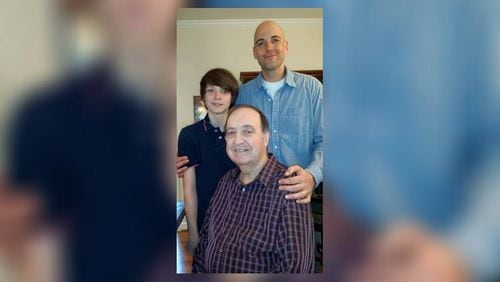 Shannon Thompson (standing) with nephew Camen Gilbert and father Larry Thompson in  2015. (Family photo)
