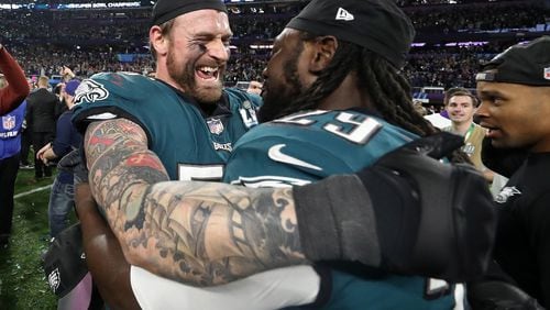 Chris Long and LeGarrette Blount celebrate after the Eagles' 41-33 victory over the Patriots in Super Bowl LII. (Rob Carr/Getty Images)
