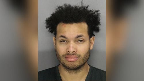 Peter Lampley is accused of fatally shooting a man at a Taco Mac restaurant in Cobb County on Monday afternoon, according to police.