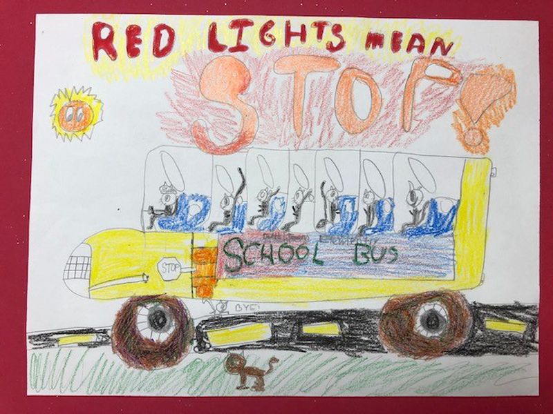 Amaya Williamson of Dutchtown Elementary School won the Division 1 contest in Henry County Schools bus safety poster competition.