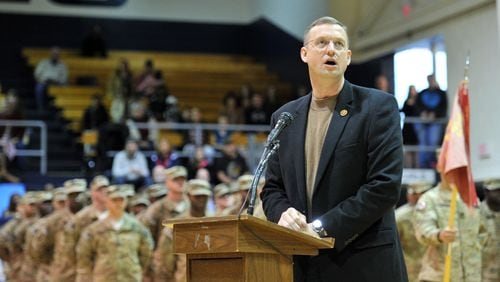 U.S. Rep. Doug Collins welcomes the troops with the 1-214th Field Artillery Battalion in 2014 from nearly a year in Afghanistan. HYOSUB SHIN / HSHIN@AJC.COM