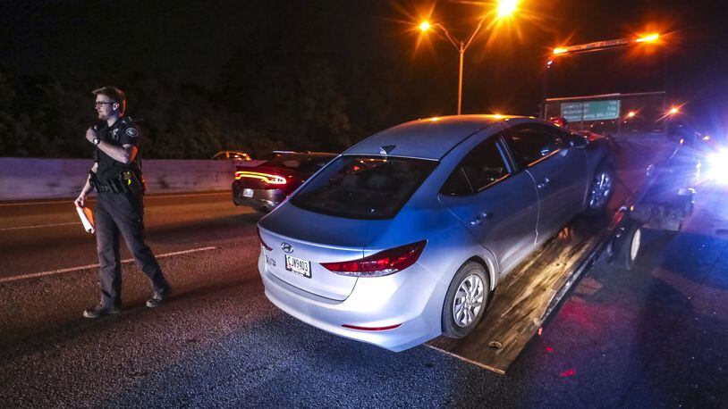 Atlanta police cleared the scene of a crash and shooting investigation on I-20 between Langhorn Street and Joseph E. Lowery Boulevard on the morning of May 6, 2020, after a man flagged down the officers, telling them that bullets went through his vehicle and hit him in the back. JOHN SPINK/JSPINK@AJC.COM