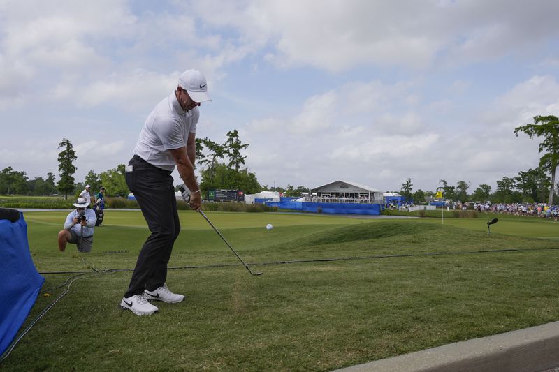Rory McIlroy, of Northern Ireland, chips for the rough onto the 17th green during the final round of the PGA Zurich Classic golf tournament at TPC Louisiana in Avondale, La., Sunday, April 28, 2024. (AP Photo/Gerald Herbert)