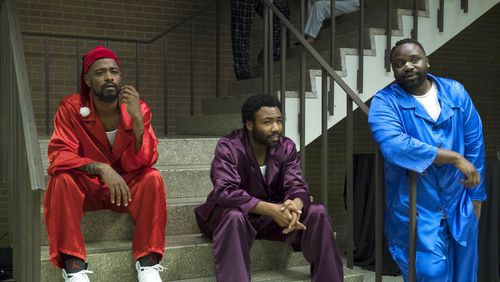 This image released by FX shows, from left, Lakeith Stanfield, Donald Glover and Brian Tyree Henry in a scene from the comedy series "Atlanta." The program was nominated for an Emmy on Thursday for outstanding comedy series. The 70th Emmy Awards will be held on Monday, Sept. 17.  (Guy D'Alema/FX via AP)