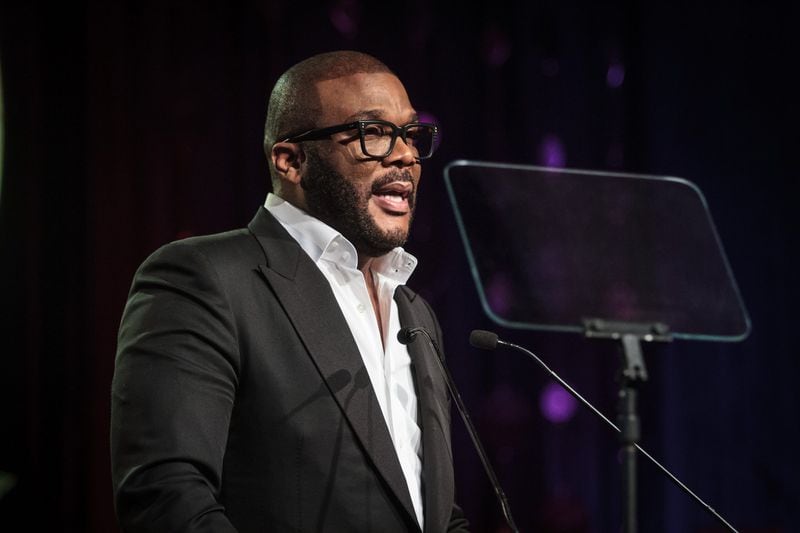 Actor, director and producer Tyler Perry talks to a large crowd gathered for the Candle In The Dark Gala, celebrating the 150th anniversary of Morehouse College in Atlanta on February 18, 2017. STEVE SCHAEFER / SPECIAL TO THE AJC