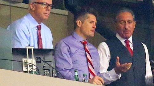 Falcons president Rich McKay (from left), general manager Thomas Dimitroff and owner Arthur Blank watch the Falcons play the Buccaneers at the Georgia Dome in Atlanta in December of 2012. Curtis Compton, ccompton@ajc.com