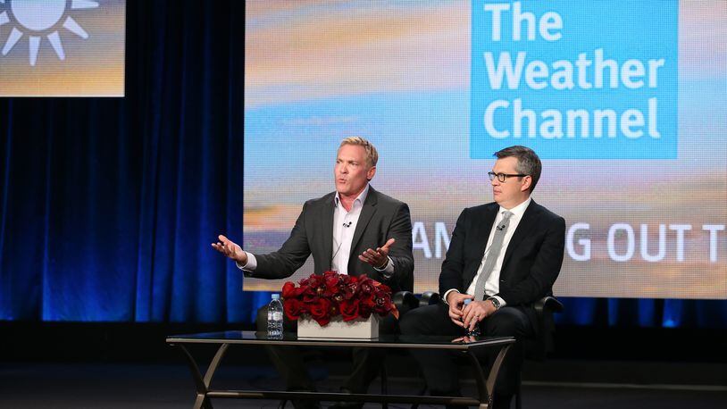 David Clark, President, The Weather Channel, and weather anchor and managing editor Sam Champion, speak onstage during the 'New Morning Show on The Weather Channel' ' panel discussion at The Weather Channel portion of the 2014 Winter Television Critics Association tour at the Langham Hotel on January 11, 2014 in Pasadena, California.