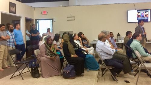About 80 people gathered Saturday at a small mosque in Johns Creek to discuss policing and the death of a 36-year-old Somali-born woman who was killed when she was wandering her subdivision during an apparent mental breakdown in a confrontation with police officers. (Photo by Bill Torpy / AJC)