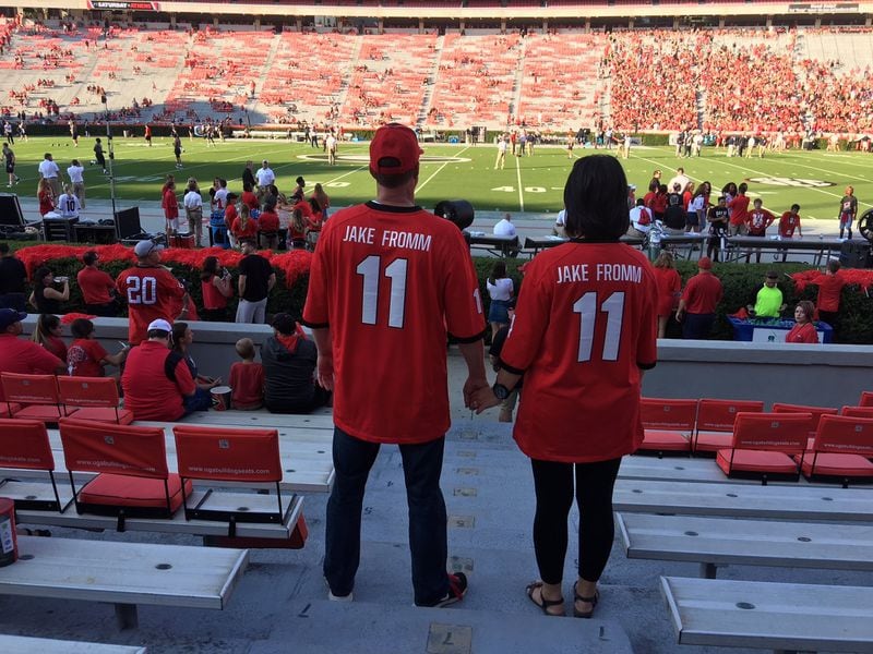 Both Charlie and Connie Bibb became fans of No. 11 Jake Fromm, the freshman quarterback at UGA, because he’s from their hometown (and, says Connie, he’s easy to look at.) 