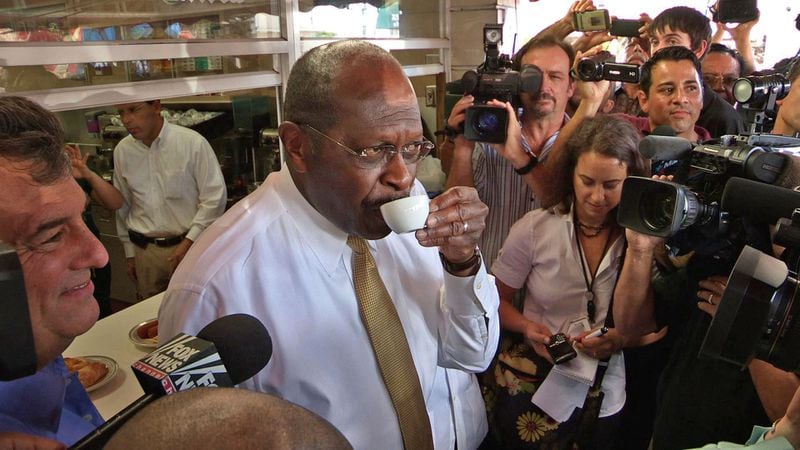 Herman Cain at a Florida stop near the end of campaign in 2011. AP file
