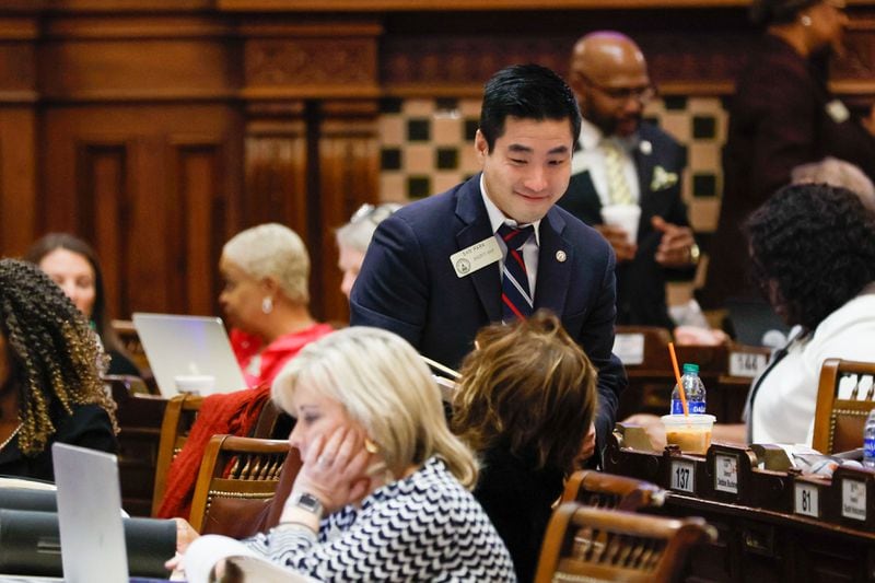Minority Whip Sam Park, D-Lawrenceville, is seen talking with lawmakers at the Capitol. There are three legislative days left in the 2023-2024 session.