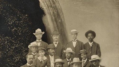 This photograph shows a group of founding members of the Niagara Movement superimposed over an image showing Niagara Falls in the background; (l. to r.) front row, Henry L. Baily of Washington, D.C., Clement G. Morgan of Massachusetts, W.H.H. Hart of Washington, D.C., and B.S. Smith of Kansas; middle row, Frederick L. McGhee of Minnesota, Norris Bumstead Herndon, son of Alonzo Herndon, J. Max Barber of Illinois, W.E.B. Du Bois of Alanta, Georgia, and Robert Bonner of Massachusetts; back row, H.A. Thompson of New York, Alonzo F. Herndon of Georgia, John Hope of Georgia, and an unidentified man, possibly James R.L. Diggs. (Source: W.E.B. Du Bois Library, Special Collections & University Archives, UMass Amherst)