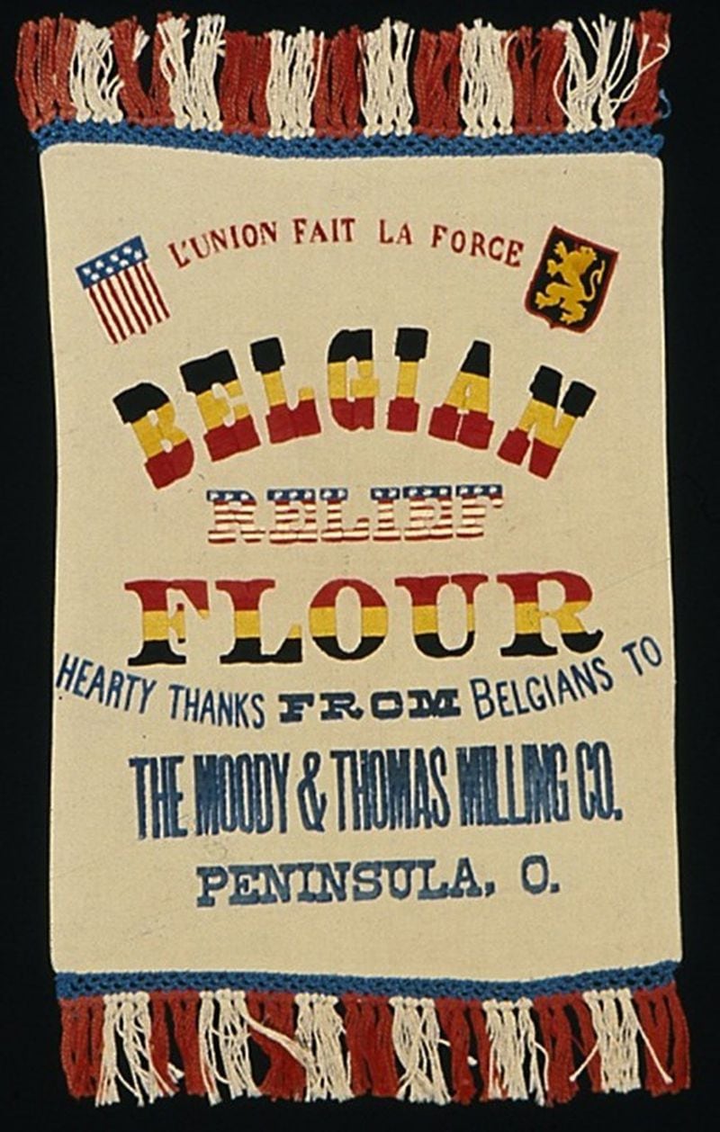 The Atlanta History Center is enhancing the touring exhibition “The Great War in Broad Outlines” with additions including six flour sacks from America that were among thousands that, after the contents fed wartime Belgians, were decorated by Belgian women, then sold to benefit war charities. This one and five others are on loan from the Herbert Hoover Presidential Library and Museum.