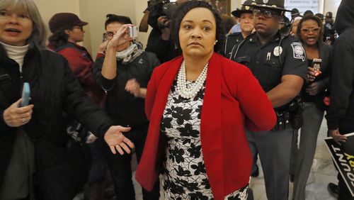 11/13/18 - Atlanta - Senator Nikema Williams, District 39 Democrat, is arrested for failing to disperse during a demonstartion in the rotunda.  Lawmakers were back in town Tuesday in a special session to begin considering two bills - one to provide $270 million in aid to SW Georgia and the other to give airlines and farmers a tax break for re-planting trees    BOB ANDRES / BANDRES@AJC.COM