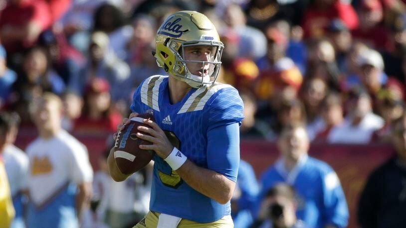 UCLA quarterback Josh Rosen looks to pass during the first half of an NCAA college football game against Southern California, Saturday, Nov. 28, 2015, in Los Angeles. (AP Photo/Jae C. Hong)