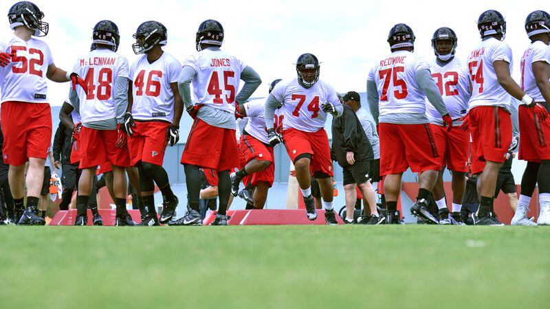 Falcons rookies run drills during the first day of 2016 rookie minicamp at the team's Flowery Branch headquarters.
