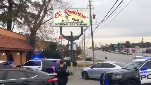 The man is accused of robbing Mexican restaurant El Ranchero on Cobb Parkway.