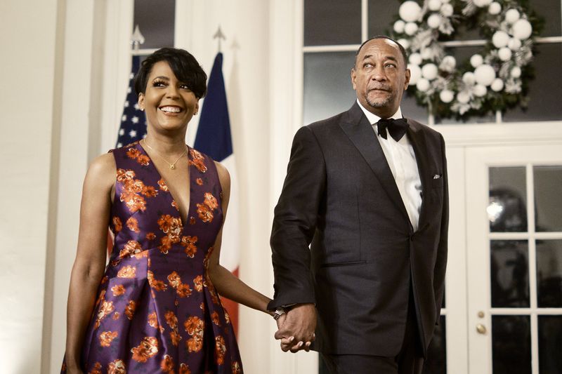 Keisha Lance Bottoms, the former mayor of Atlanta, is leaving her temporary role as a senior official in the Biden administration. She is pictured with Derek Bottoms arriving for a state dinner at the White House in Washington on Dec.1, 2022.  (T.J. Kirkpatrick/The New York Times)