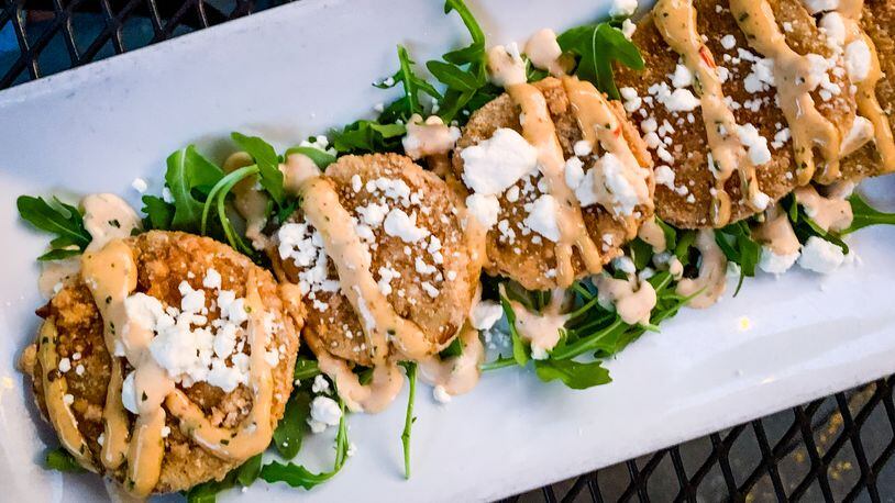 Sprig’s fried green tomatoes are comforting and well-executed.