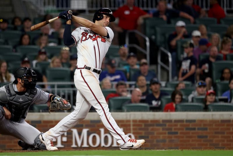 Braves first baseman Matt Olson hits a two-RBI double during the seventh inning against the Miami Marlins at Truist Park Friday, April 22, 2022, in Atlanta. (Jason Getz / Jason.Getz@ajc.com)