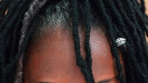 Parents are questioning school rules against braids, twists, cornrows and dreadlocks, traditional African-American hairstyles. (AJC File)