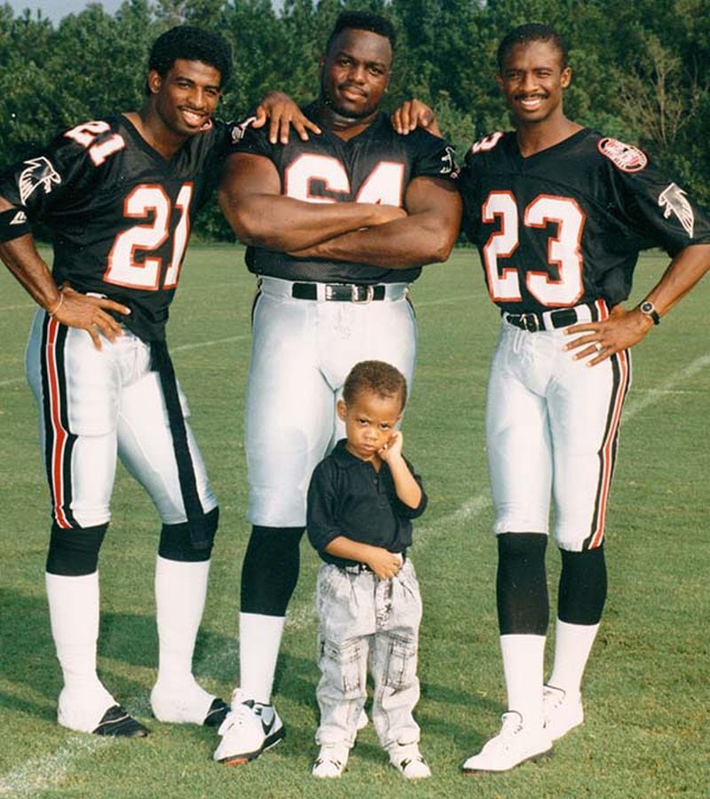 Deion Sanders (top, from left), Jamie Dukes and Bobby Butler during their Falcons days. Butler's son, Brice (bottom, front), is now a wide receiver with the Dallas Cowboys. (Special to the AJC)