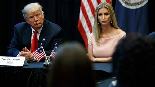 Republican presidential candidate Donald Trump, left, and his daughter Ivanka meet with spouses of military service members, Tuesday, Sept. 6, 2016, in Virginia Beach, Va. (AP Photo/Evan Vucci)