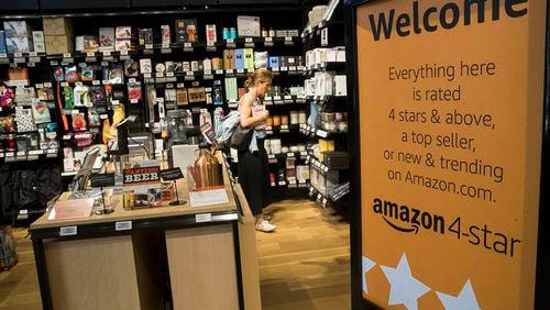 A shopper browses the items on display at the Amazon 4-star store in the Soho neighborhood of New York, Thursday, Sept. 27, 2018. (AP Photo/Mary Altaffer)