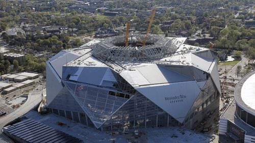 March 31,  2017 - Atlanta - Mercedes Benz Stadium, future home of the Atlanta Falcons, sits next to the Georgia Dome.  Aerial photos shot March 31, 2017.   BOB ANDRES  /BANDRES@AJC.COM