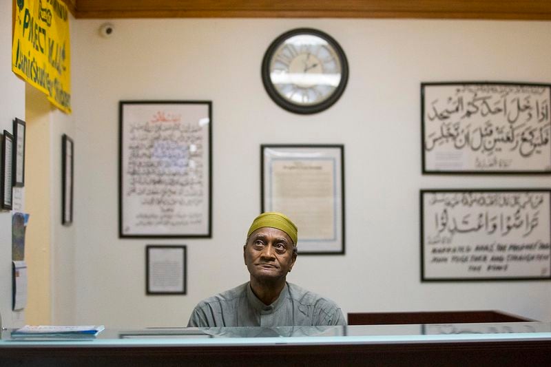 Abdulkarim S. Muhammad watches multiple security cameras on a screen during the Jum'ah Friday prayer at the Masjid Al-Mu'minun mosque in Atlanta's Peoplestown neighborhood, Friday, March 15, 2019. Muhammad mans a desk at the mosque where he checks large bags and reminds members of the congregation to turn off their cell phones. 
