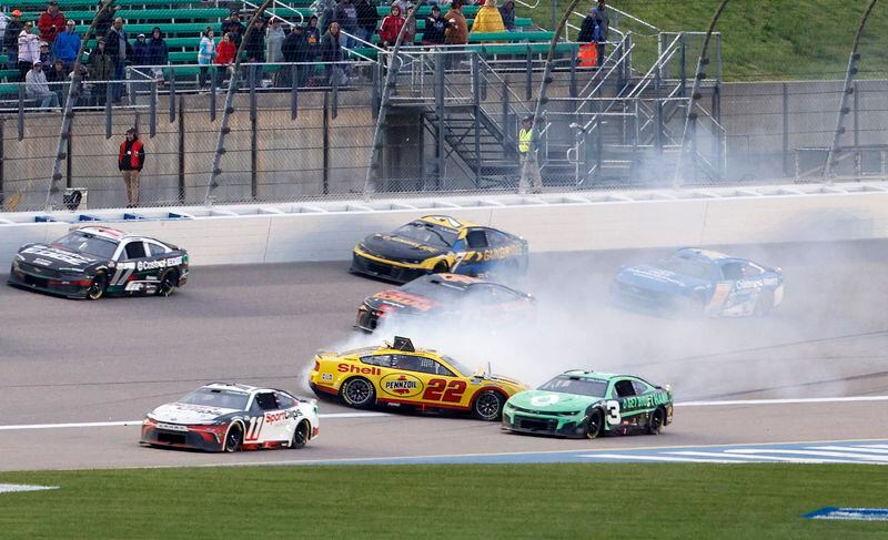 Joey Logano (22) spins out after hitting the wall in Turn 4 during a NASCAR Cup Series auto race at Kansas Speedway in Kansas City, Kan., Sunday, May 5, 2024. (AP Photo/Colin E. Braley)
